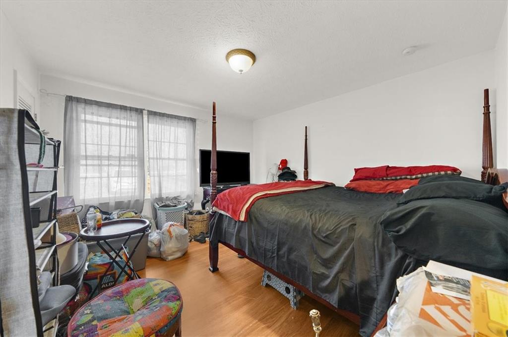 1059 Old Alabama Road Southwest Mableton, GA 30126 - Photo 21 of 33 a bedroom with a bed and a tv