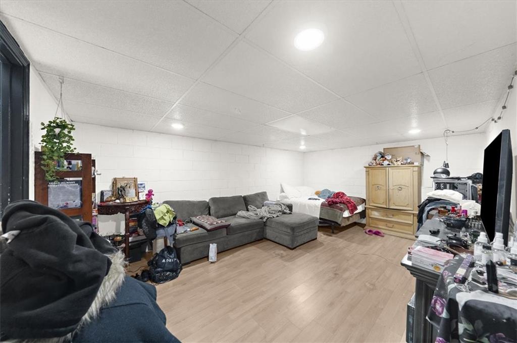 1059 Old Alabama Road Southwest Mableton, GA 30126 - Photo 24 of 33 a living room with furniture and a flat screen tv