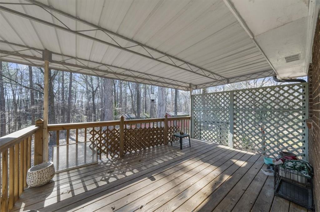 1059 Old Alabama Road Southwest Mableton, GA 30126 - Photo 27 of 33 a view of deck with wooden floor and outdoor space