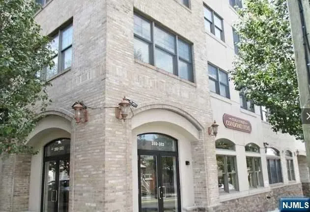 a view of building with glass windows