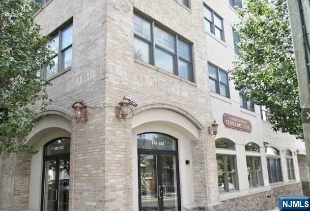 380-382 Anderson Avenue, Unit C1 Cliffside Park, NJ 07010 - Photo 1 of 17 a view of building with glass windows