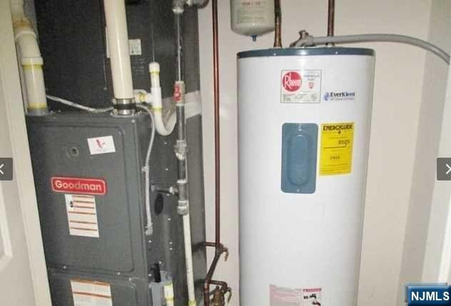 380-382 Anderson Avenue, Unit C1 Cliffside Park, NJ 07010 - Photo 17 of 17 a utility room with a washer and dryer