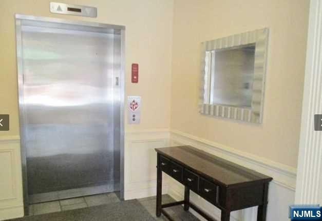 380-382 Anderson Avenue, Unit C1 Cliffside Park, NJ 07010 - Photo 5 of 17 a bathroom with a shower and a sink