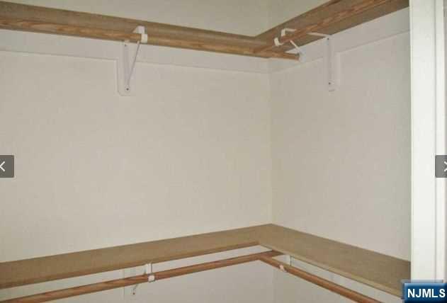 380-382 Anderson Avenue, Unit C1 Cliffside Park, NJ 07010 - Photo 10 of 17 a view of a room with racks on the wall