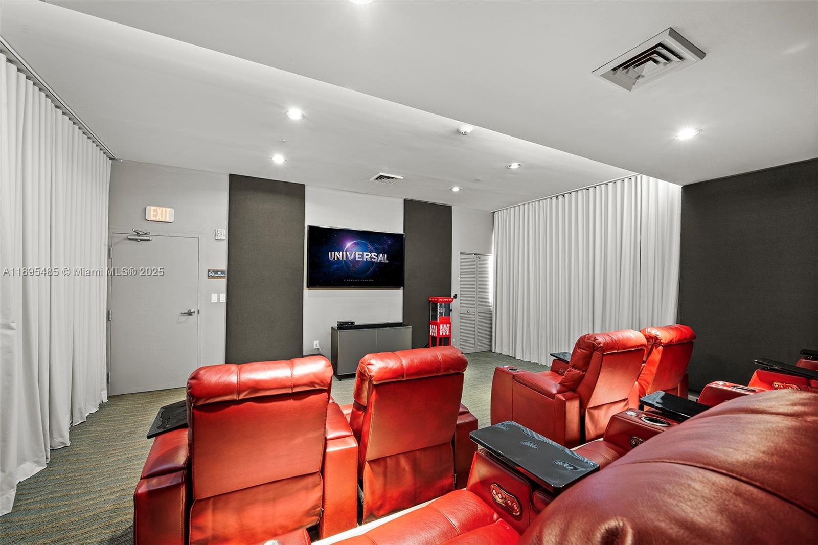 600 Northeast 27th Street, Unit 3105 Miami, FL 33137 - Photo 30 of 61 a living room with furniture and a flat screen tv