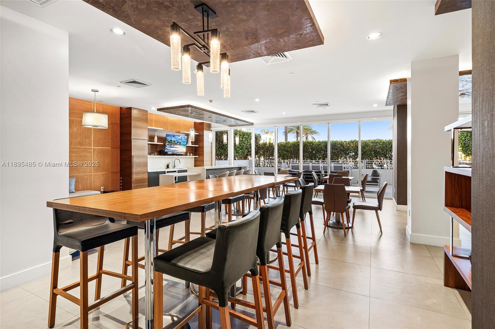 600 Northeast 27th Street, Unit 3105 Miami, FL 33137 - Photo 32 of 61 a dining area with a table tennis and a table