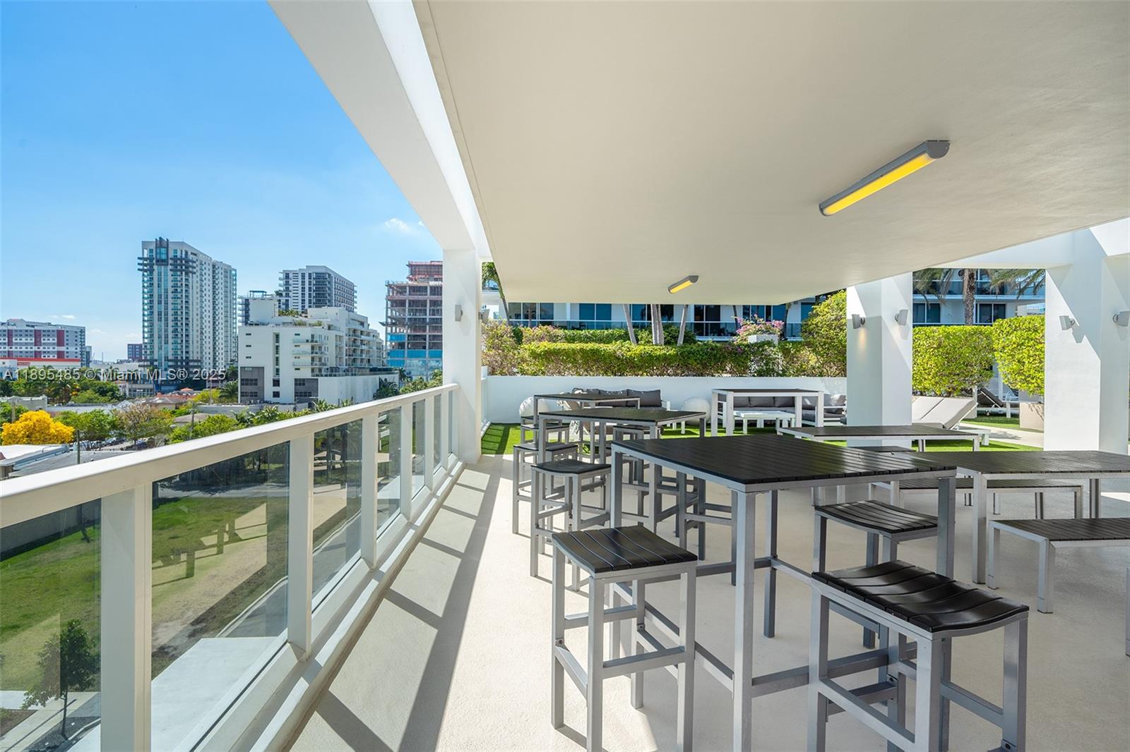 600 Northeast 27th Street, Unit 3105 Miami, FL 33137 - Photo 41 of 61 a view of a chairs and table in the terrace