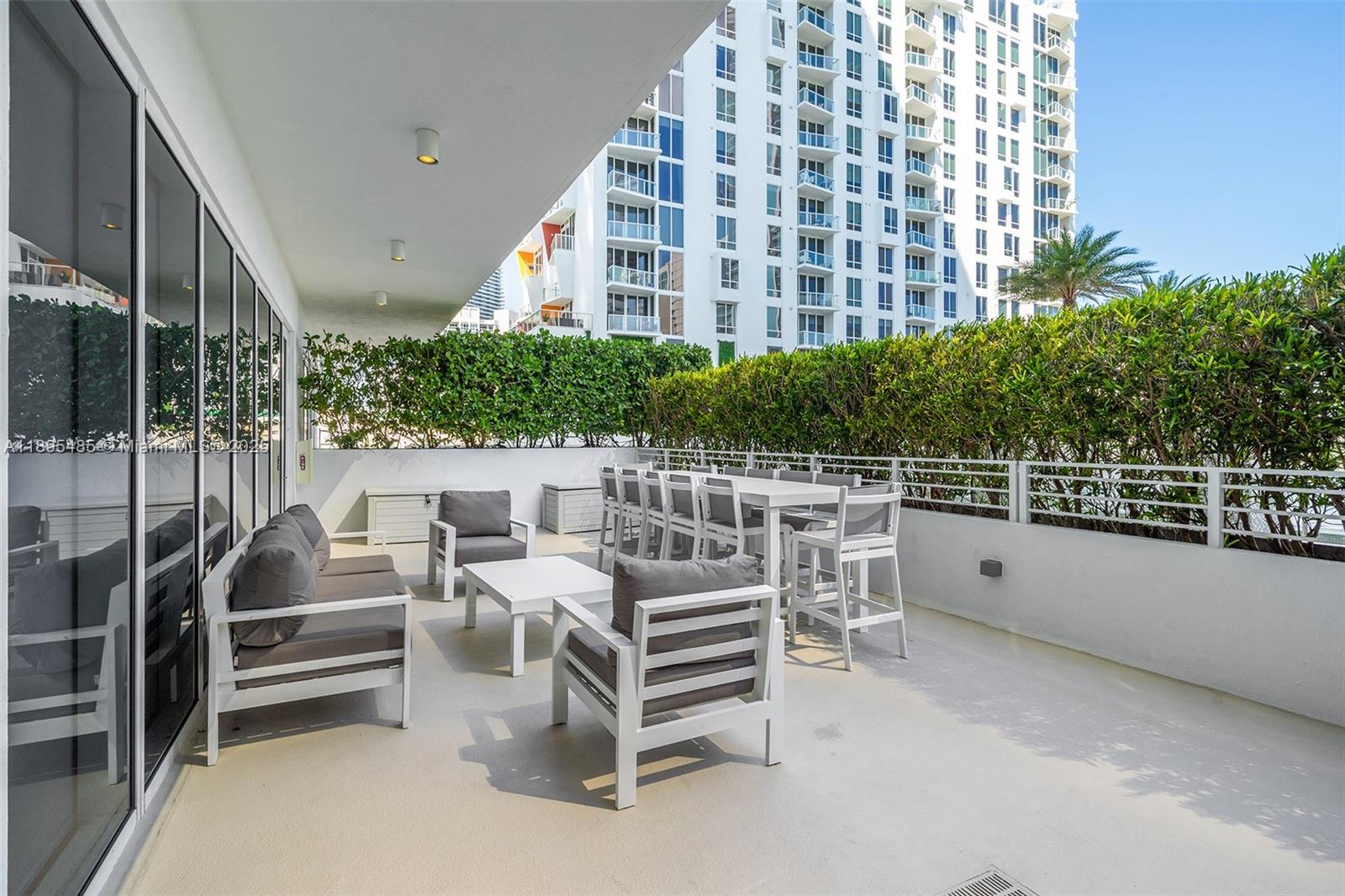 600 Northeast 27th Street, Unit 3105 Miami, FL 33137 - Photo 47 of 61 a view of a balcony with chairs