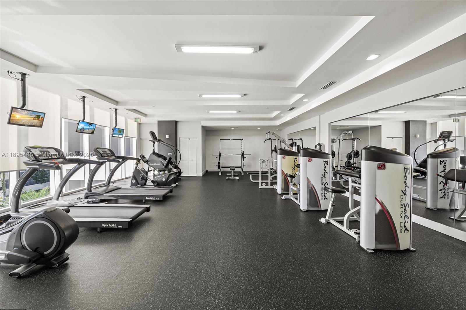 600 Northeast 27th Street, Unit 3105 Miami, FL 33137 - Photo 49 of 61 a view of a room with gym equipment