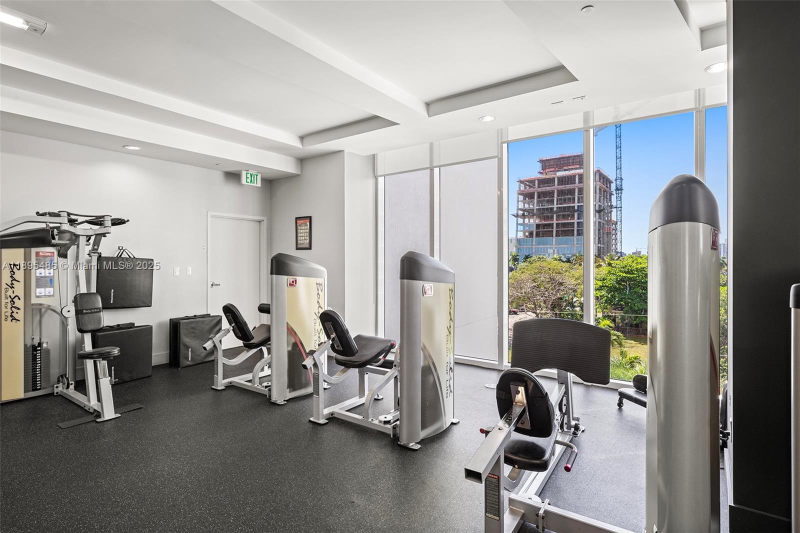 600 Northeast 27th Street, Unit 3105 Miami, FL 33137 - Photo 51 of 61 a view of a workspace with furniture and a window