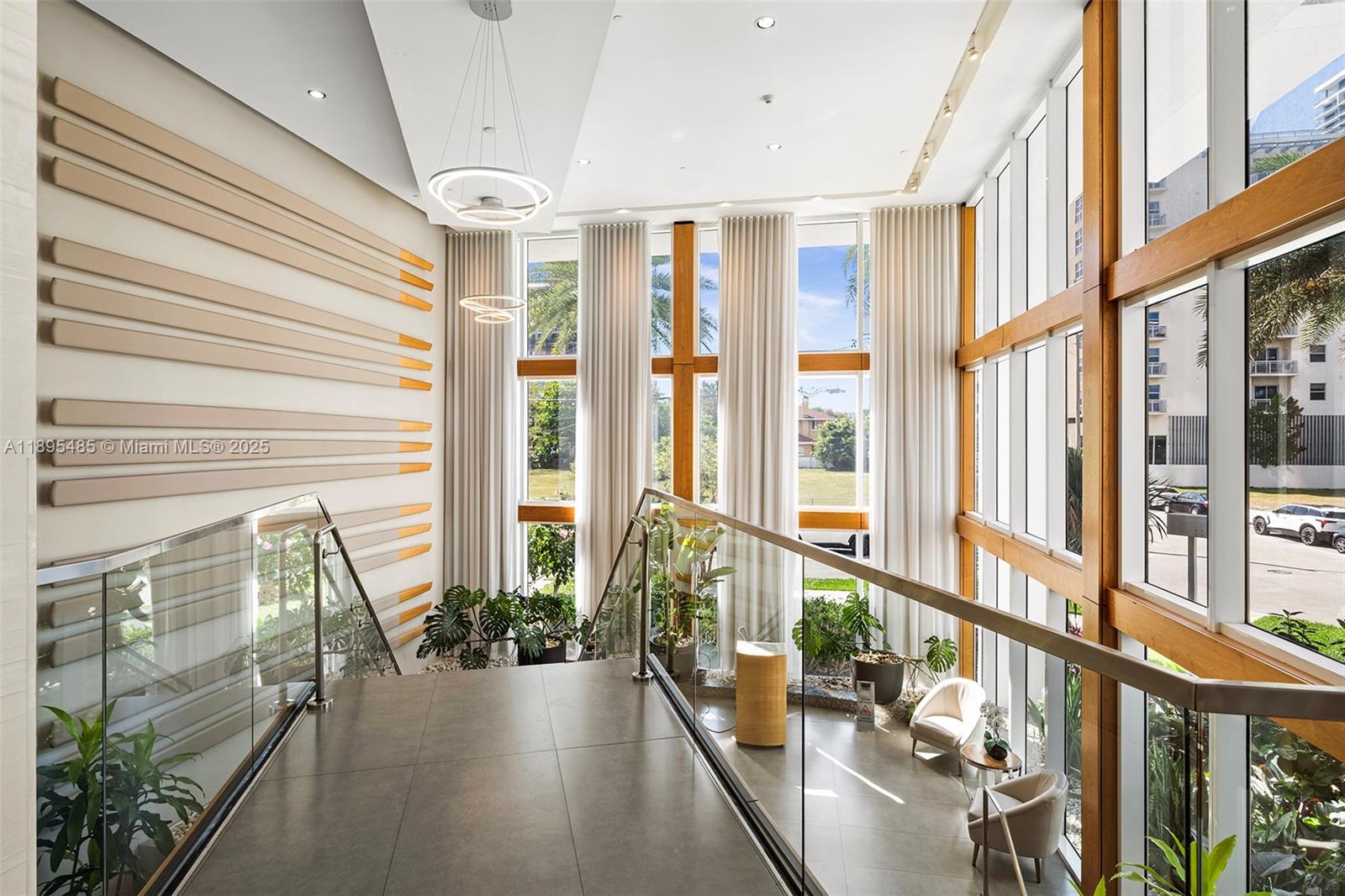 600 Northeast 27th Street, Unit 3105 Miami, FL 33137 - Photo 58 of 61 a view of an entryway with wooden floor and windows