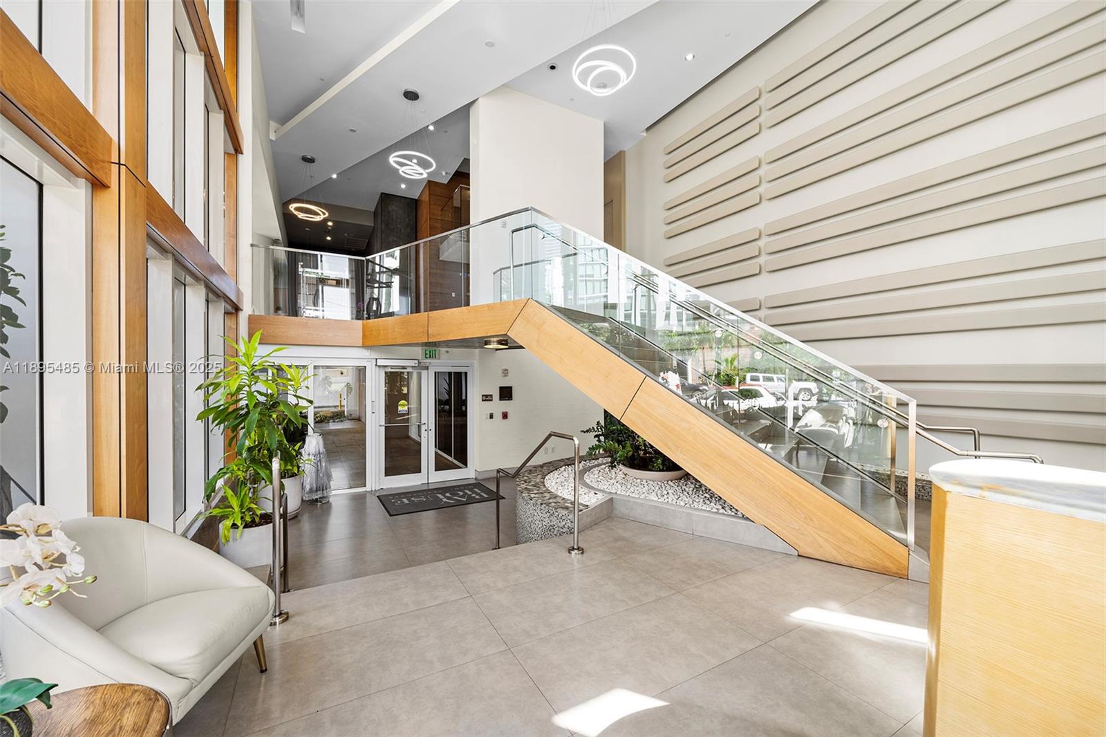 600 Northeast 27th Street, Unit 3105 Miami, FL 33137 - Photo 59 of 61 a view of an chairs and table in the balcony