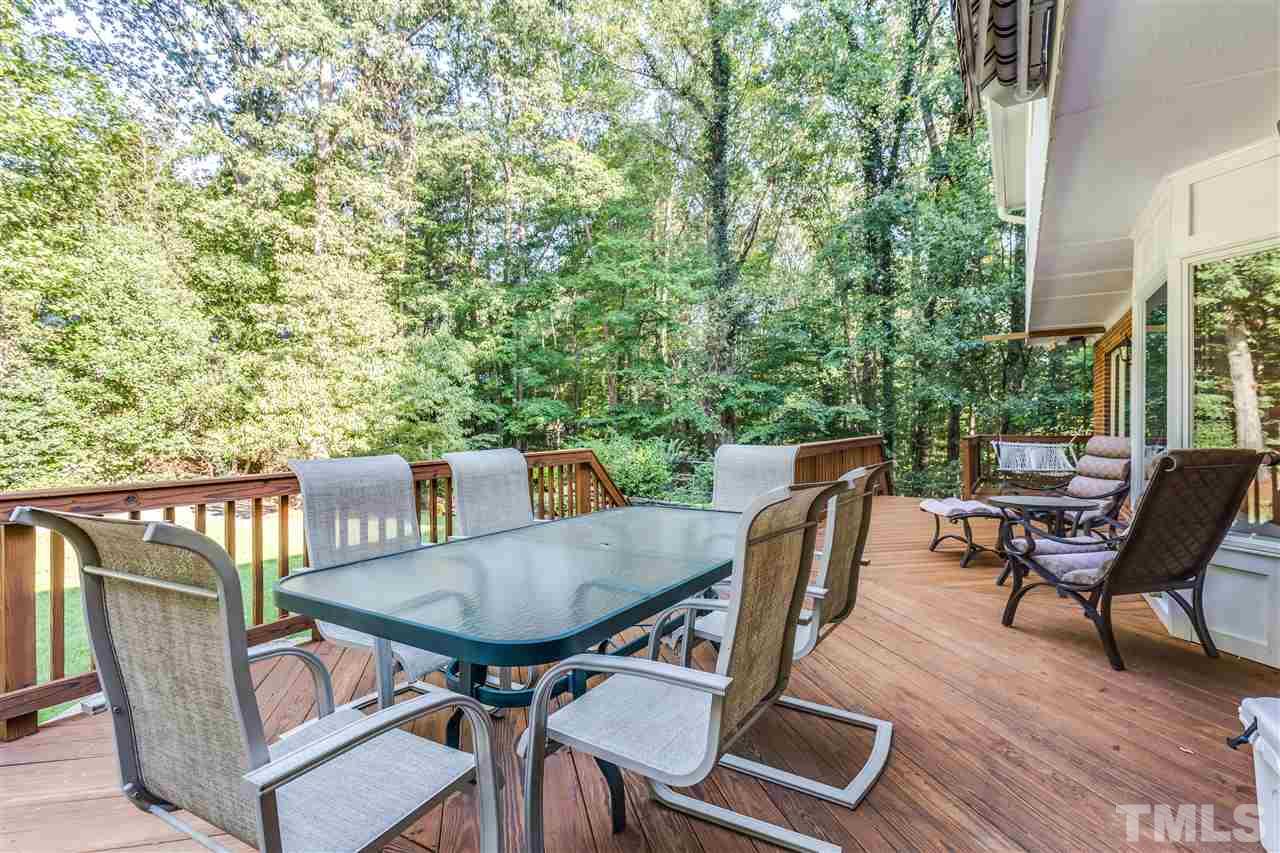 8713 Cliff Top Court Raleigh, NC 27613 - Photo 24 of 25 a view of a outdoor seating area with furniture
