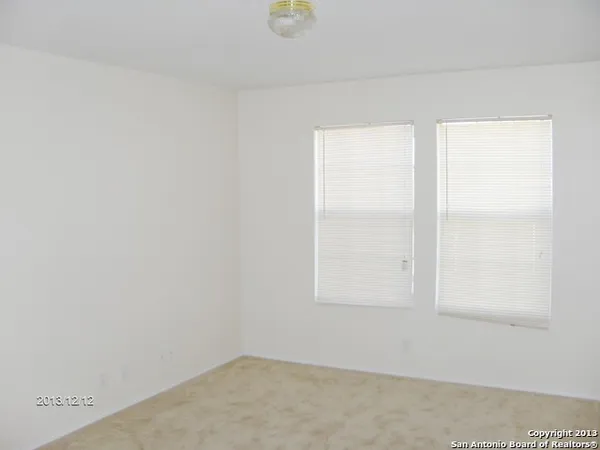 a view of a room with a window