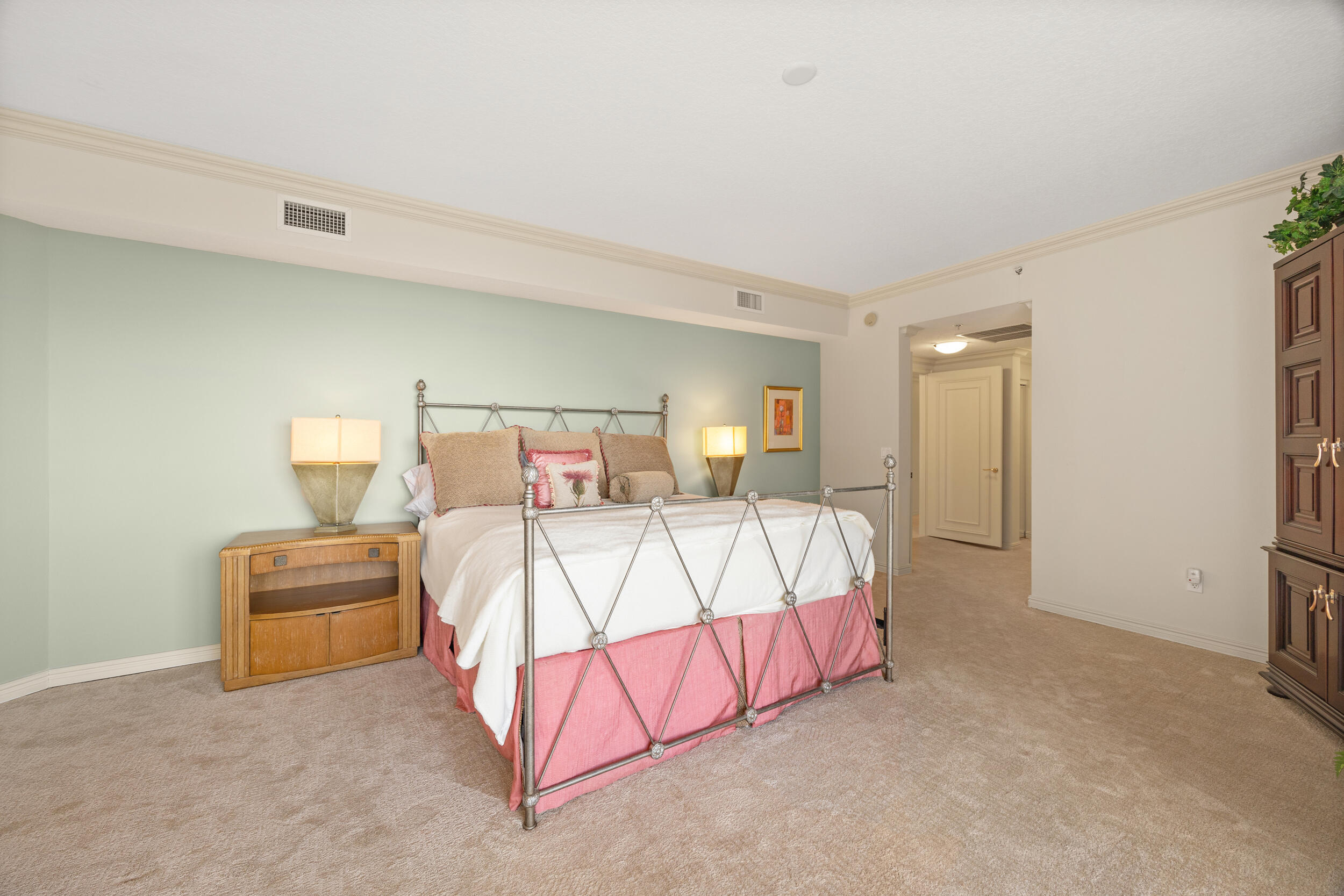 700 Ocean Royale, Unit 601 Juno Beach, FL 33408 - Photo 23 of 56 a bedroom with a bed and window