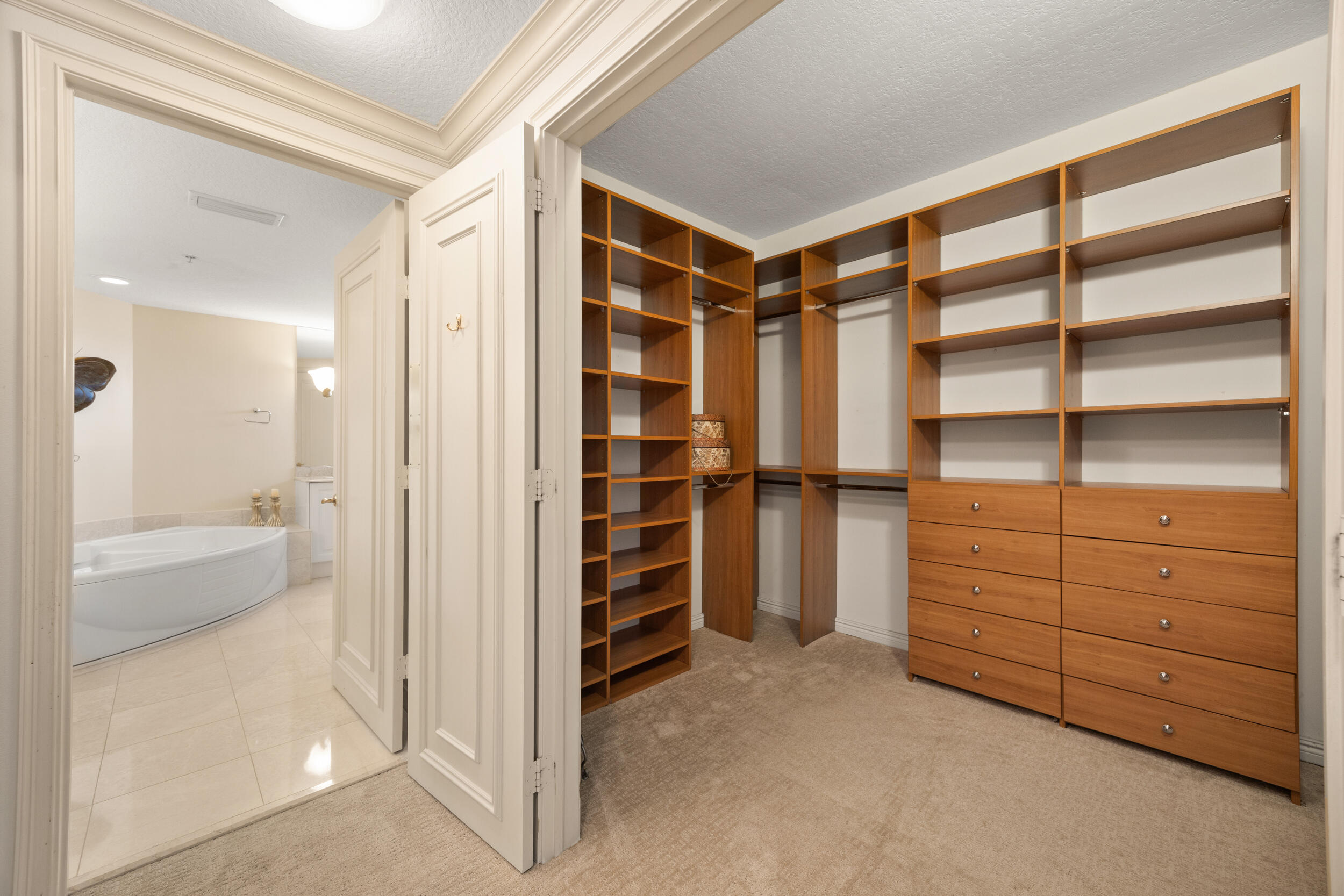 700 Ocean Royale, Unit 601 Juno Beach, FL 33408 - Photo 24 of 56 a view of walk in closet and bedroom view