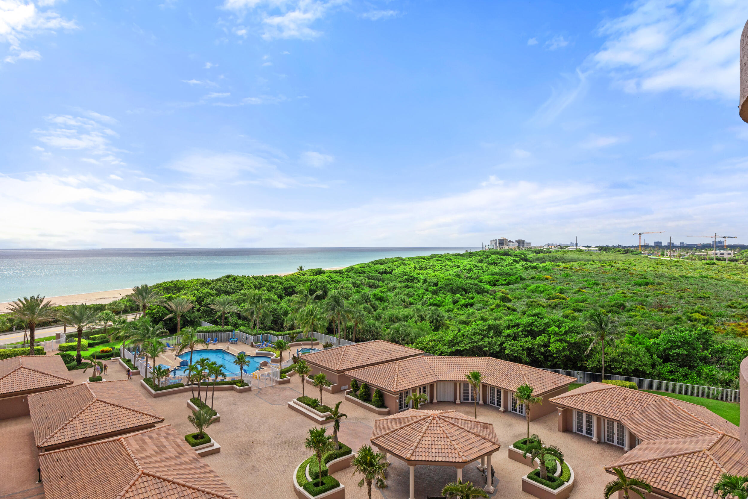 700 Ocean Royale, Unit 601 Juno Beach, FL 33408 - Photo 37 of 56 an outdoor space with furniture and garden