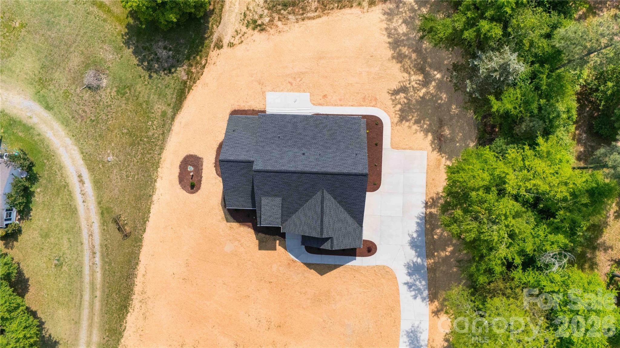 352 Adams Road Clover, SC 29710 - Photo 38 of 38 a aerial view of a house with table and chairs
