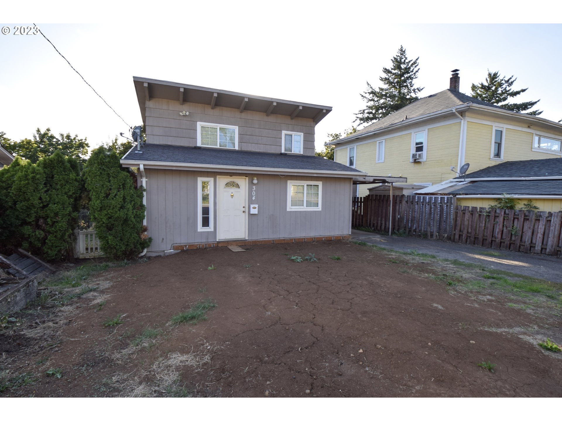 304 Southeast Boulevard Way Estacada, OR 97023 - Photo 2 of 15 a view of a house with a backyard