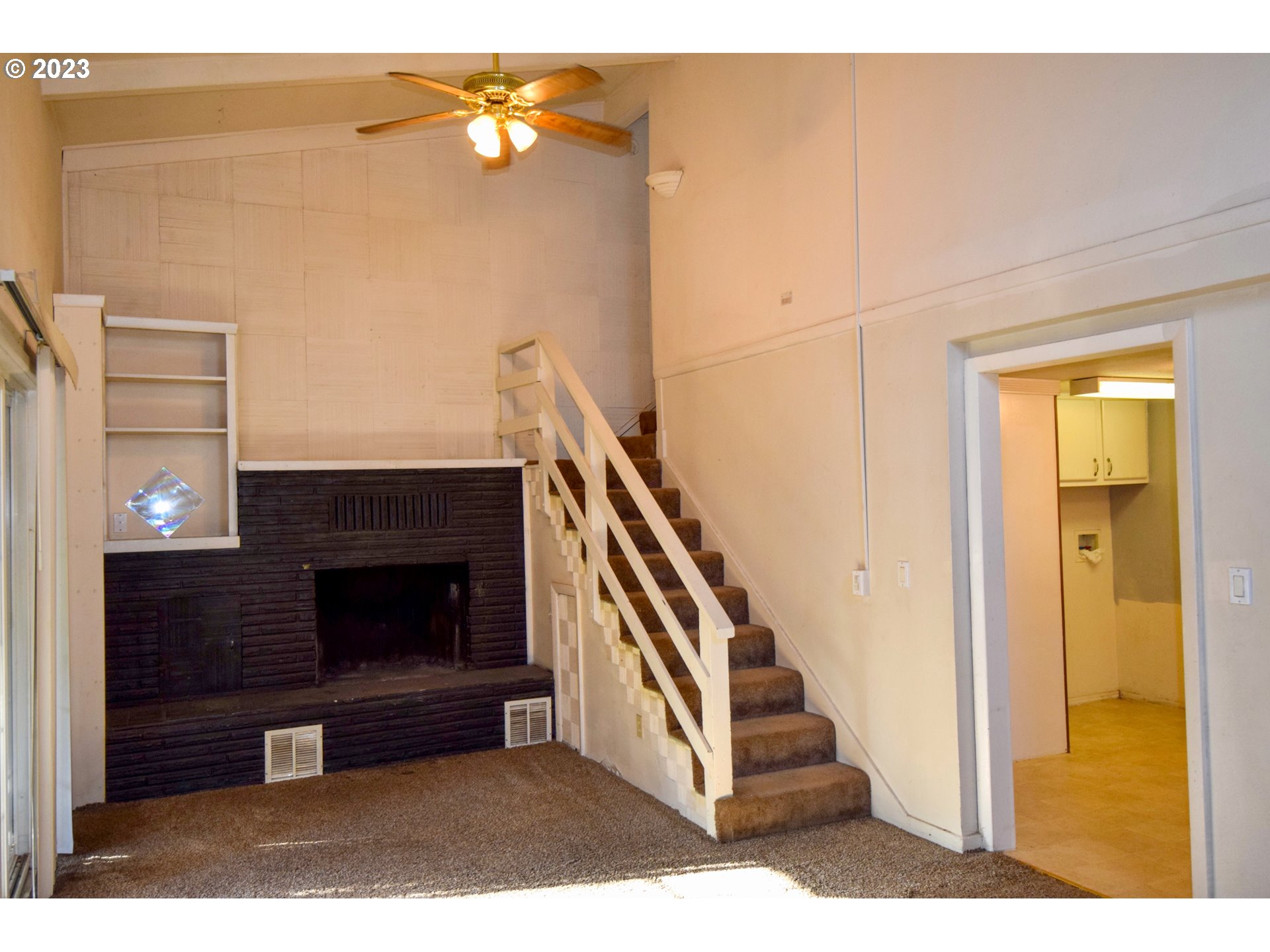 304 Southeast Boulevard Way Estacada, OR 97023 - Photo 8 of 15 a living room with furniture and a fireplace