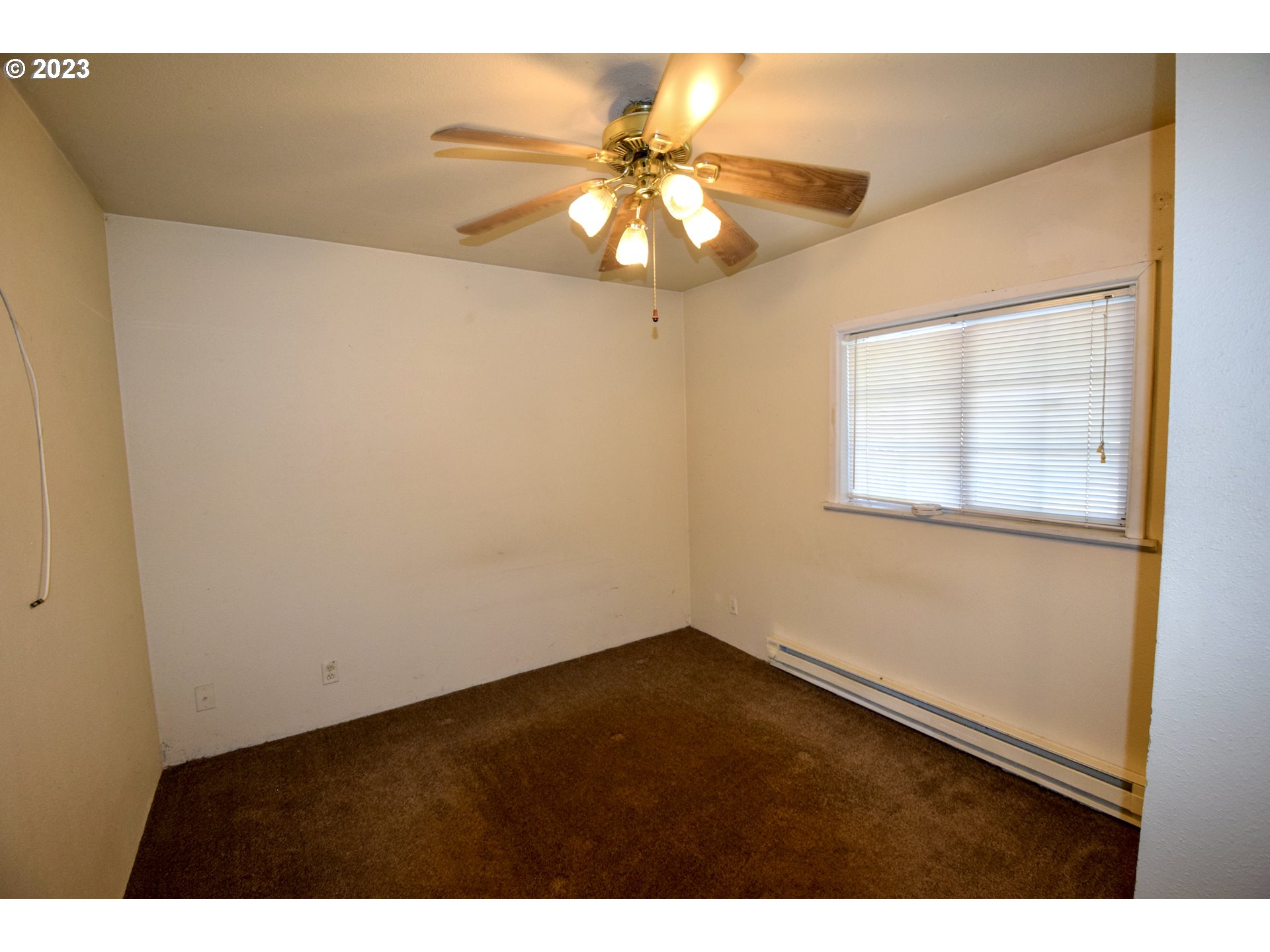 304 Southeast Boulevard Way Estacada, OR 97023 - Photo 10 of 15 a view of an empty room with a window