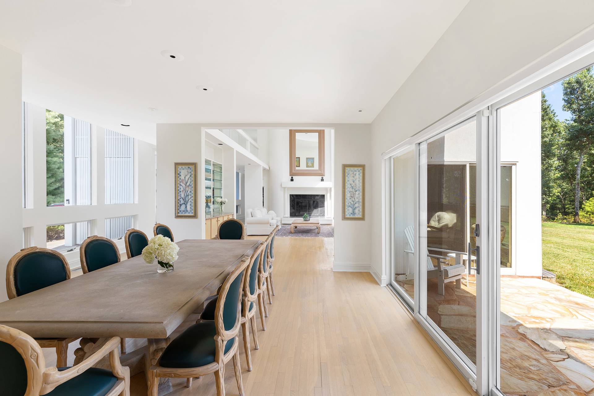 147 Old Northwest Road East Hampton, NY 11937 - Photo 11 of 45 a view of a a dining room with furniture window and wooden floor