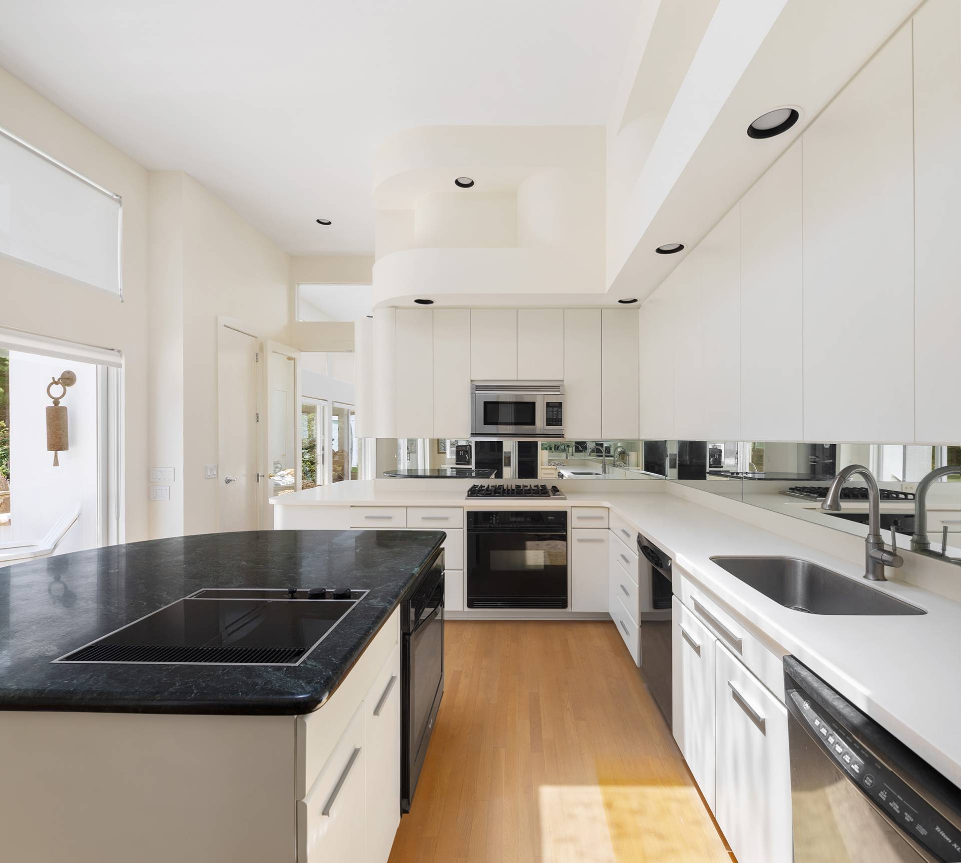 147 Old Northwest Road East Hampton, NY 11937 - Photo 13 of 45 a kitchen with a sink stove and refrigerator