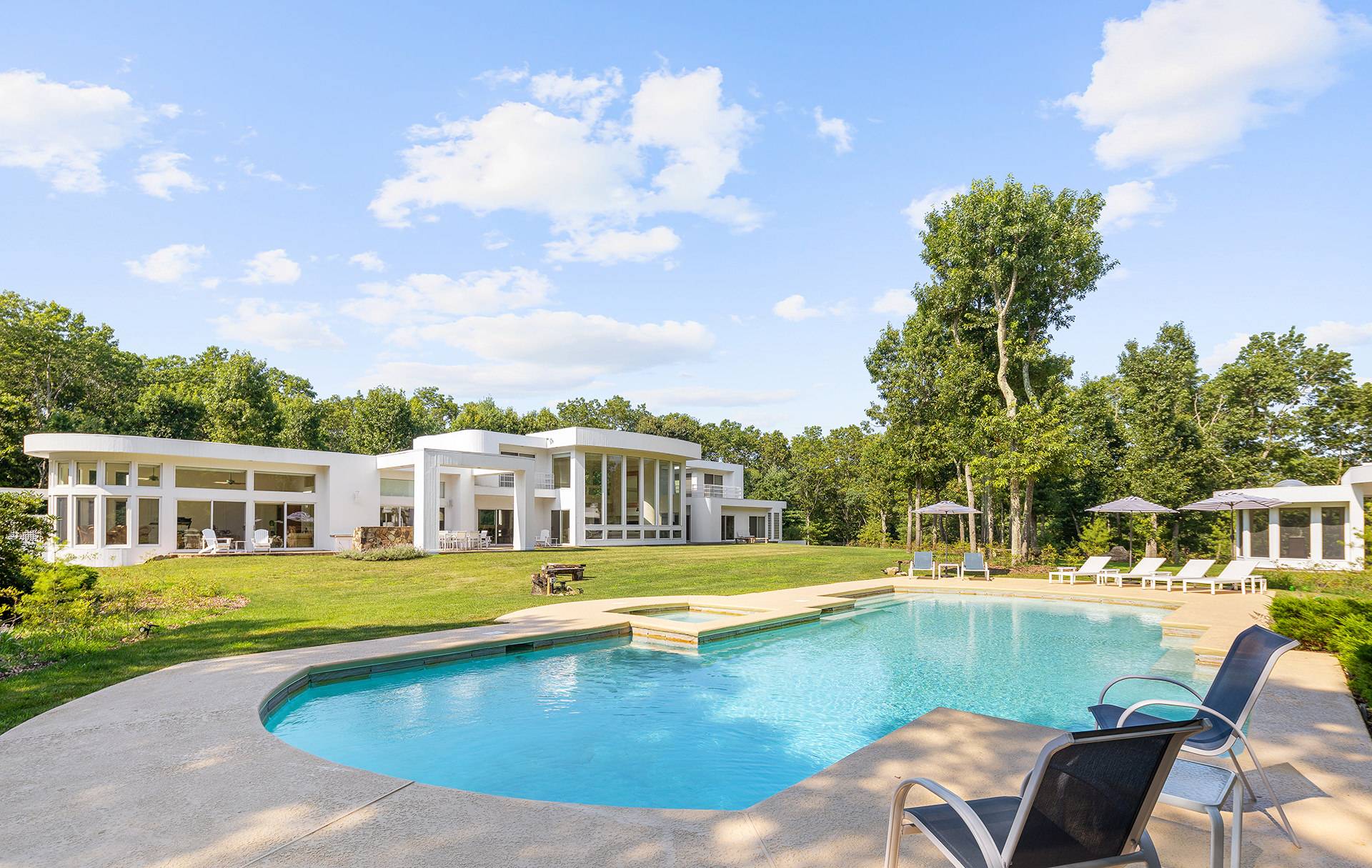 147 Old Northwest Road East Hampton, NY 11937 - Photo 2 of 45 a view of a house with swimming pool and sitting area