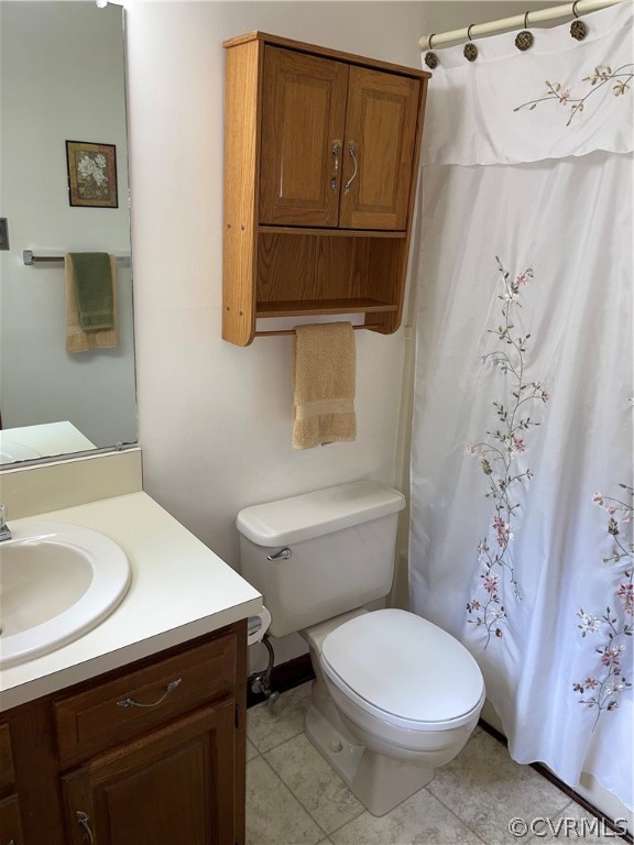 12100 Quito Road Midlothian, VA 23112 - Photo 23 of 33 a white toilet sitting next to a bathroom sink