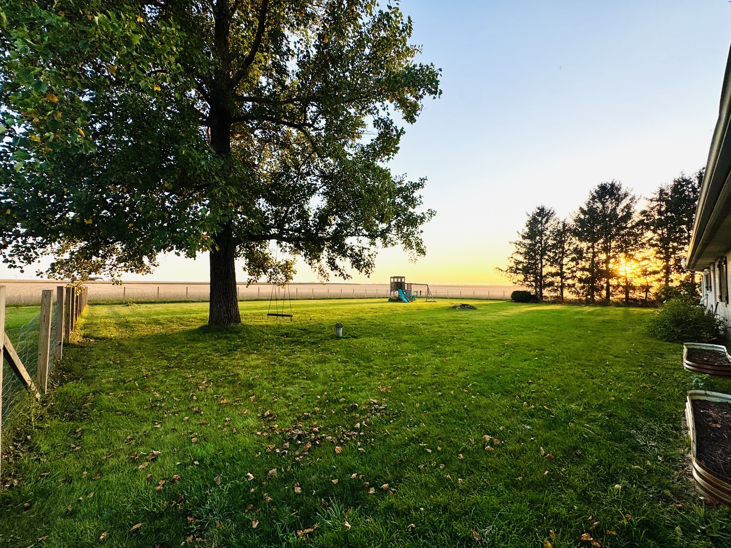 12944 Ospur Road Clinton, IL 61727 - Photo 14 of 21 a view of yard with an outdoor space