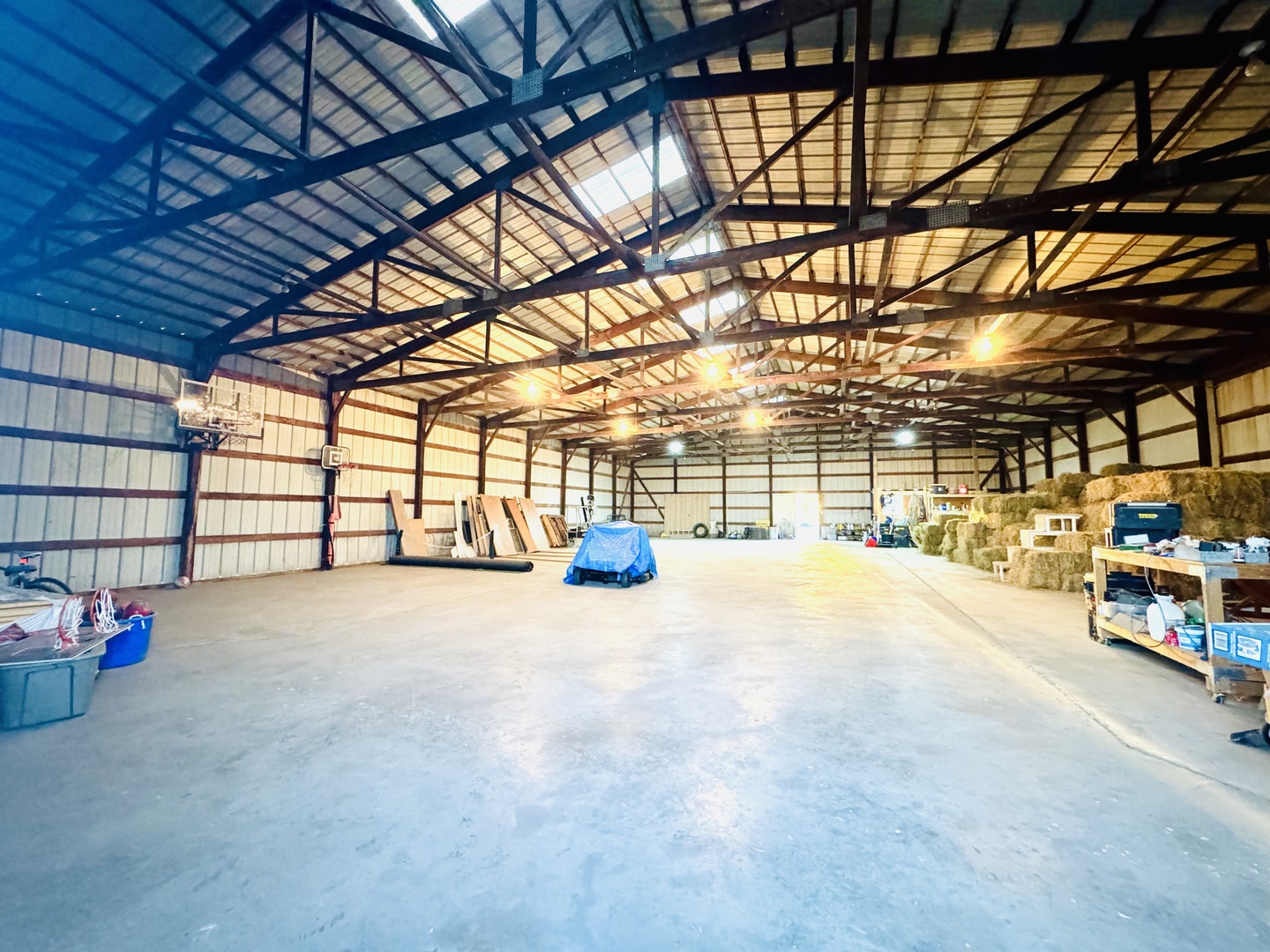 12944 Ospur Road Clinton, IL 61727 - Photo 15 of 21 a view of a garage with furniture