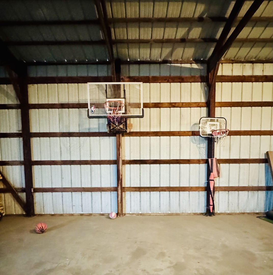 12944 Ospur Road Clinton, IL 61727 - Photo 17 of 21 a view of an empty room with a window