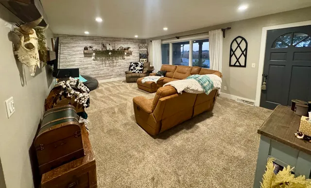 a bed room with a bed and a television