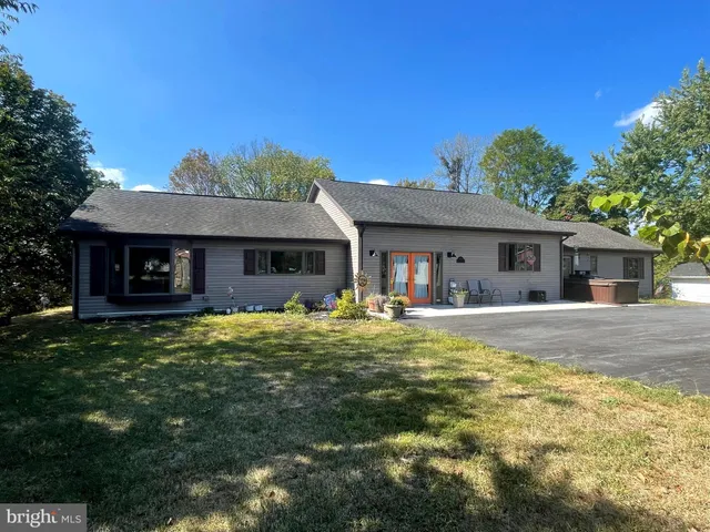 a view of a house with a swimming pool
