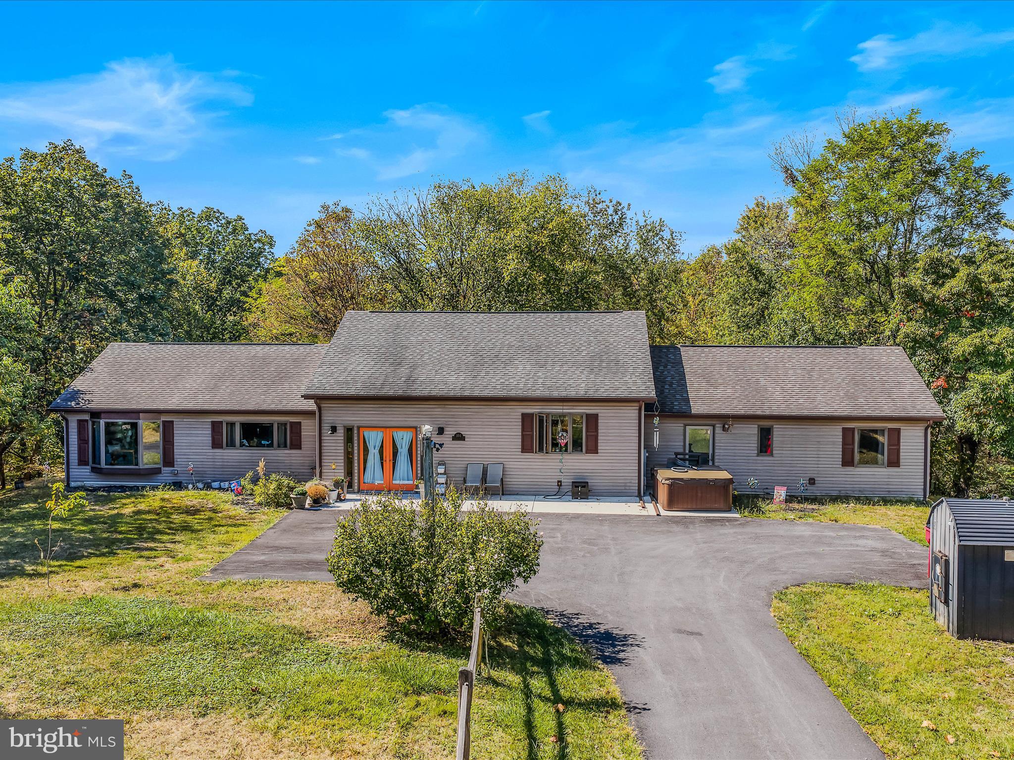 104 Golden Lane Berkeley Springs, WV 25411 - Photo 3 of 53 front view of a house with a patio