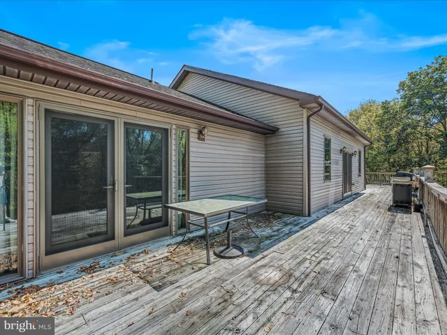 a backyard of a house with seating space