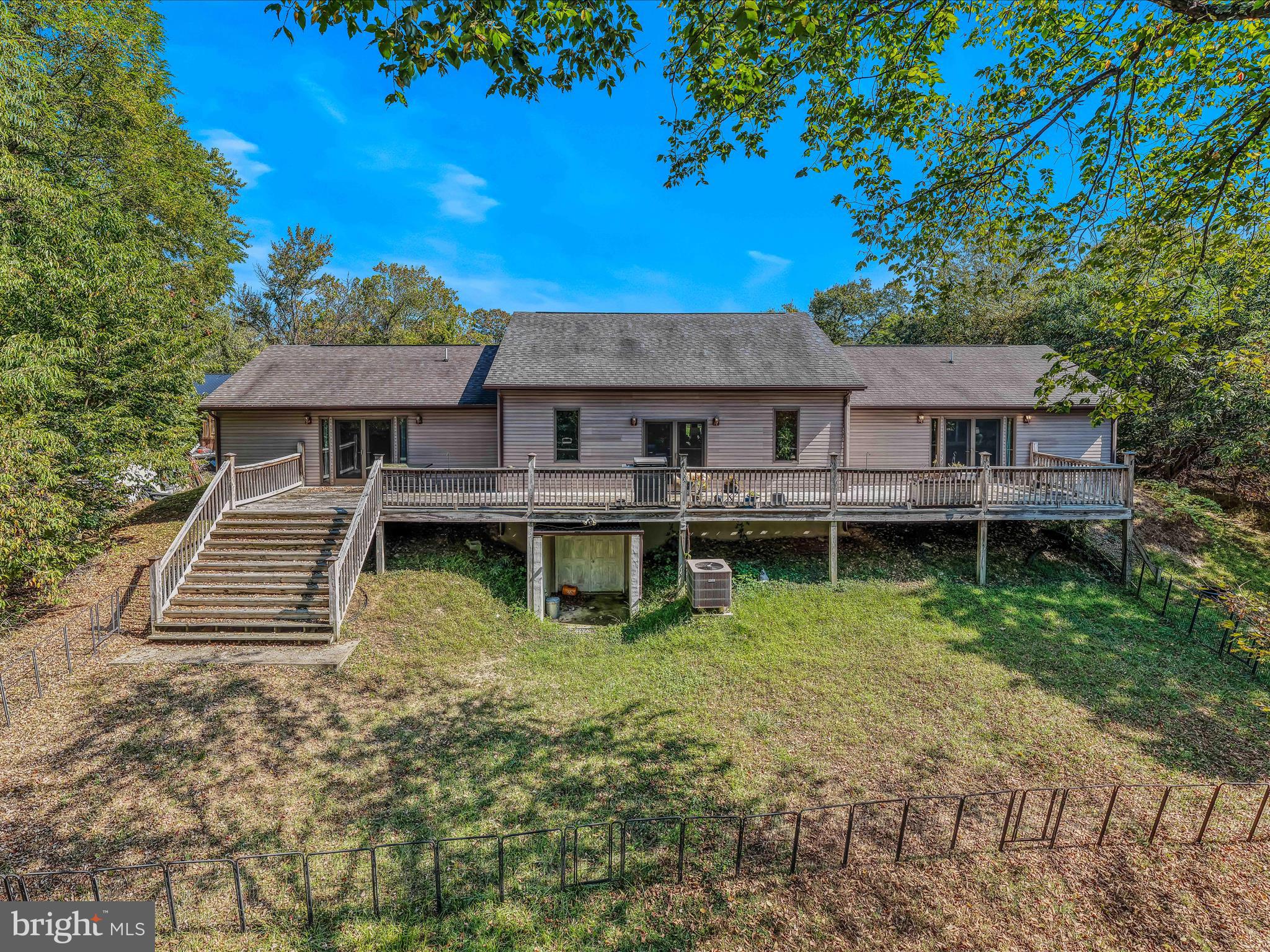 104 Golden Lane Berkeley Springs, WV 25411 - Photo 36 of 53 a view of a house with a yard