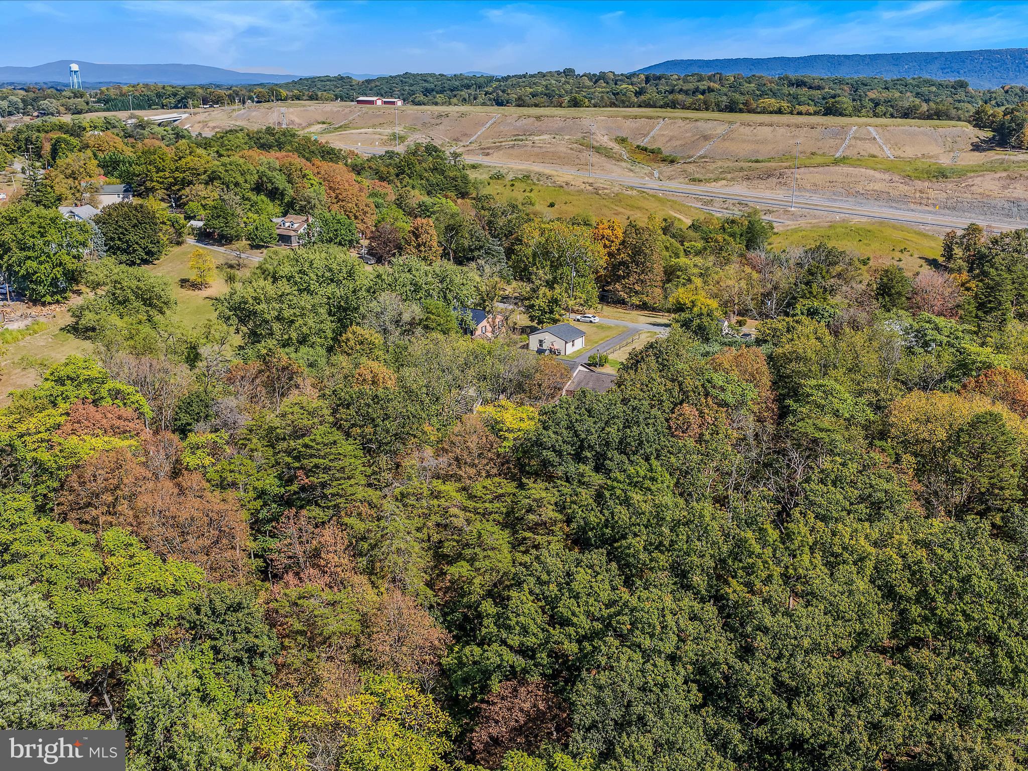 104 Golden Lane Berkeley Springs, WV 25411 - Photo 48 of 53 an aerial view of residential houses with outdoor space and trees