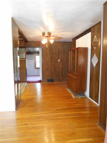 402 Hochberg Road Monroeville, PA 15146 - Photo 11 of 25 A view of the dining room which is open to the kitchen on the left. The door straight ahead leads to the 19 x 11 family room.