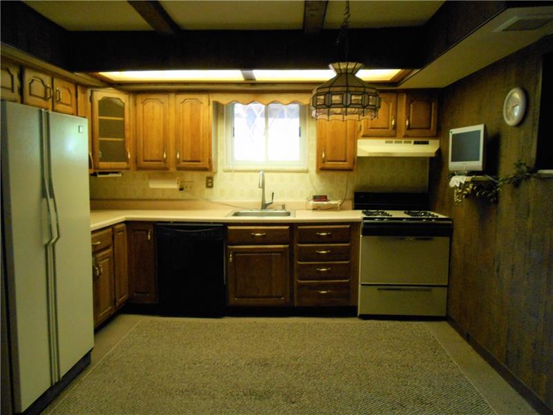 402 Hochberg Road Monroeville, PA 15146 - Photo 15 of 25 Kitchen and dining room are open and measure 15x11 combined.