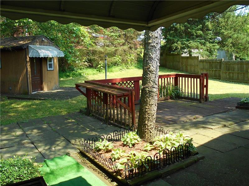 402 Hochberg Road Monroeville, PA 15146 - Photo 4 of 25 Nicely shaded and partially fenced in back yard.