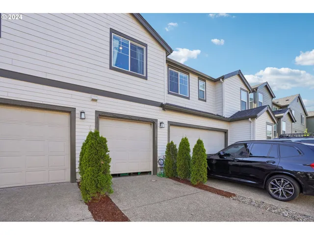 a view of a car in front of a house