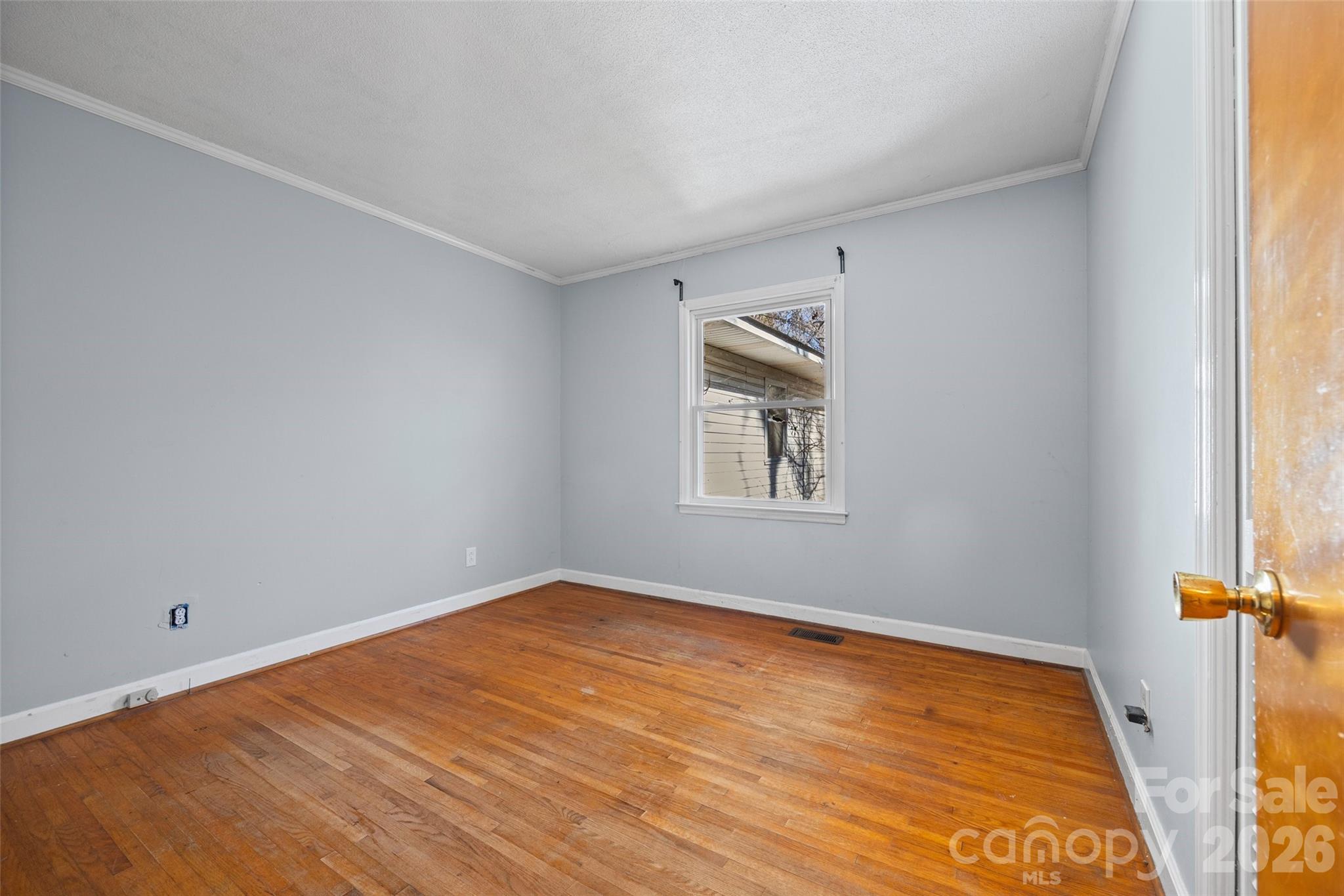 5323 South New Hope Road Belmont, NC 28012 - Photo 18 of 43 an empty room with a window