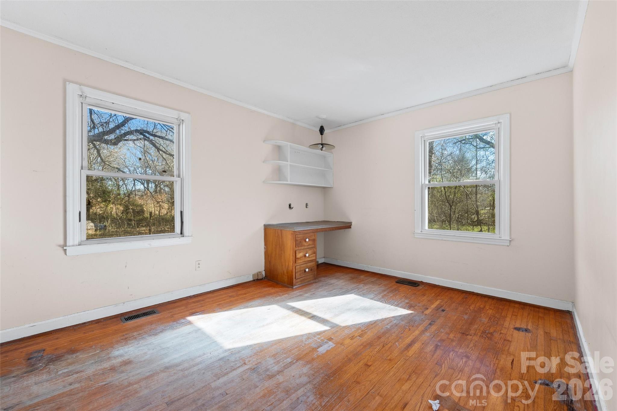 5323 South New Hope Road Belmont, NC 28012 - Photo 20 of 43 a view of empty room with wooden floor and fan