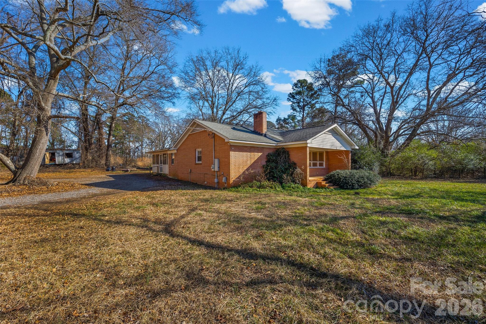 5323 South New Hope Road Belmont, NC 28012 - Photo 2 of 43 a view of a house with yard and tree s