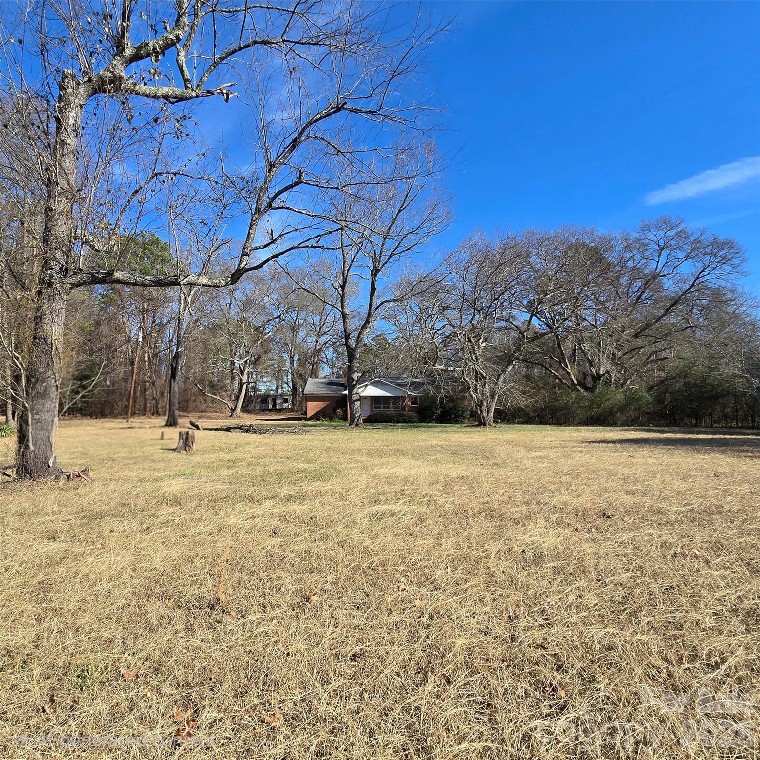 5323 South New Hope Road Belmont, NC 28012 - Photo 28 of 43 a view of outdoor space with lots of trees