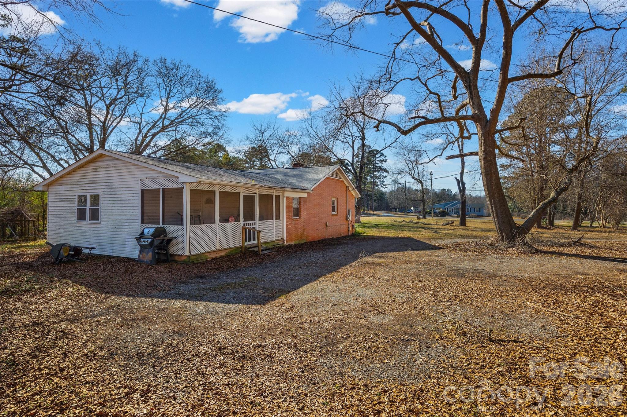 5323 South New Hope Road Belmont, NC 28012 - Photo 3 of 43 a view of a house with a yard