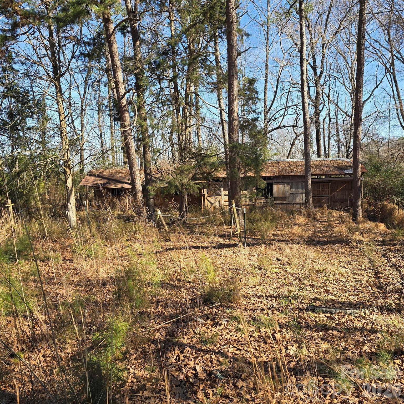 5323 South New Hope Road Belmont, NC 28012 - Photo 33 of 43 a backyard of a house with lots of green space