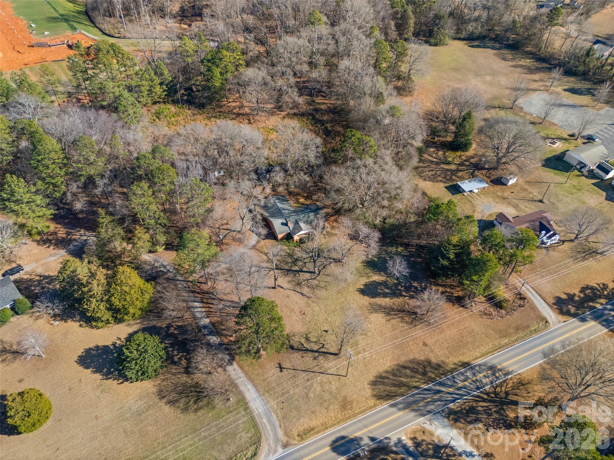 5323 South New Hope Road Belmont, NC 28012 - Photo 36 of 43 a view of a tree with a yard