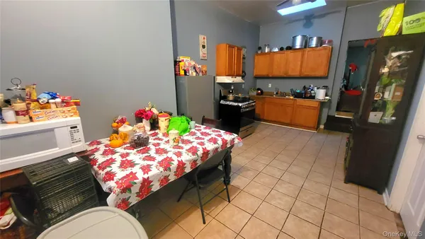 a room with furniture toys and a flat screen tv